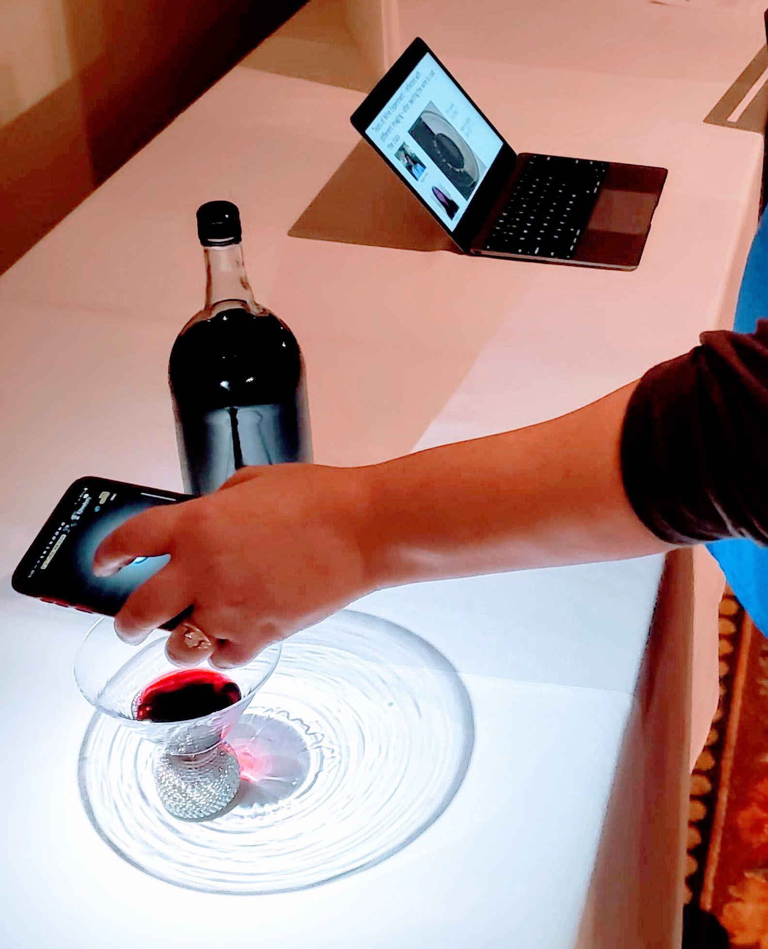 Demonstration of the famed “tears of wine” problem at the 2019 SIAM Conference on Analysis of Partial Differential Equations, held in La Quinta, Calif., this past December. Photo courtesy of Claudia Falcon.