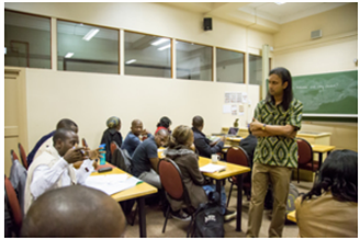 AIMS workshop participants discuss. Photo credit: AIMS