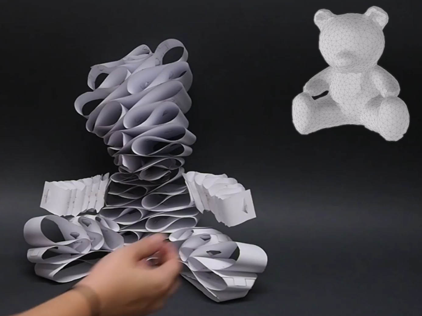 <strong>Figure 4.</strong> A metamaterial teddy bear made out of laser-cut paper loops. Figure courtesy of Alexandra Ion.