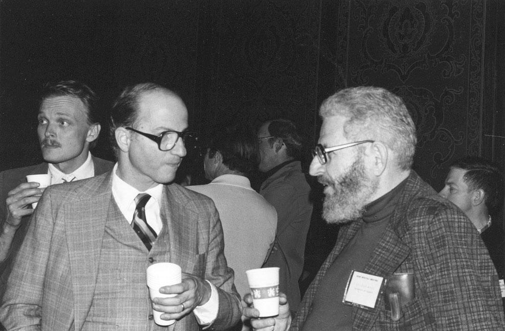 I. Edward Block (left) mingles with attendees at an early SIAM conference. SIAM photo.
