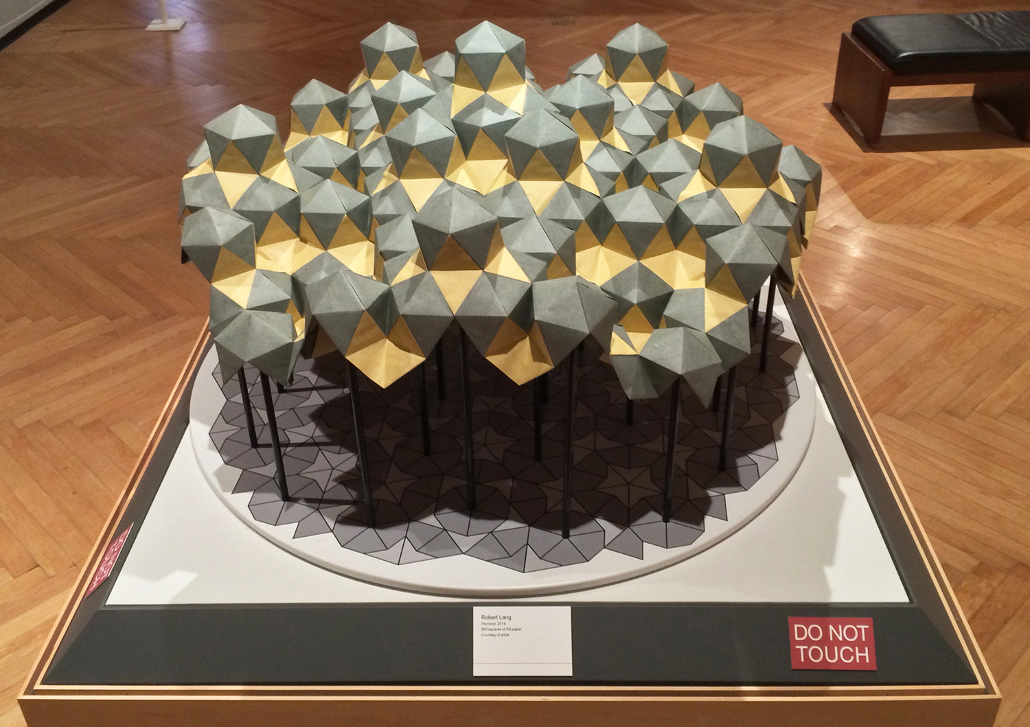 <em>Pentasia</em> (2014). This modular origami form—made from 500 sheets of paper—replicates Pentasia, a mathematical surface that was conceived of and analyzed by Barry Cipra and John H. Conway and serves as a three-dimensional version of the famous Penrose kite/dart tiling. Figure courtesy of the author.