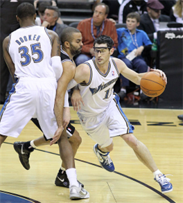 Trevor Booker (35) of the Washington Wizards sets a pick for his teammate Kirk Hinrich as part of a pick and roll offensive play. This picture was taken from <a href="http://en.wikipedia.org/wiki/File:Trevor_Booker,_Tony_Parker_and_Kirk_Hinrich.jpg" target="_blank">Wikipedia</a>.