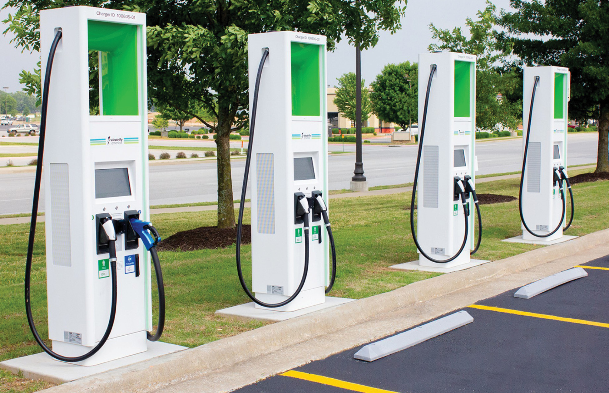 Electric vehicle (EV) charging stations. Less than three percent of U.S. vehicles are currently electric, but EV sales are increasing by each quarter. Figure courtesy of <a href="https://www.progressive-charlestown.com/2023/12/high-speed-electric-vehicle-charging.html" target="_blank"> Progressive Charlestown</a>.
