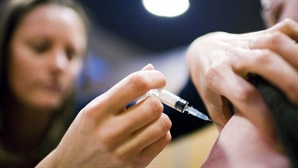 Receiving a vaccine injection. Photo courtesy Gates Foundation, Flickr Creative Commons