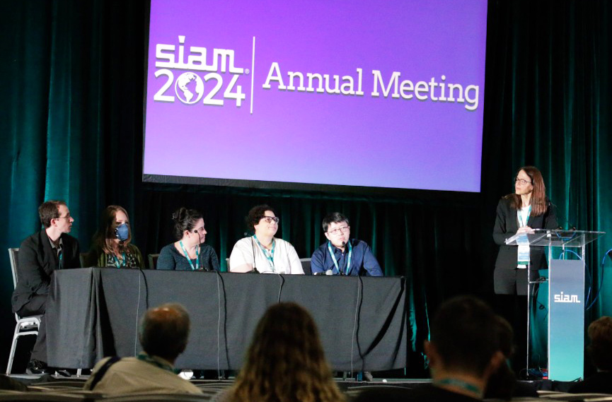 During the 2024 SIAM Annual Meeting, which took place last July in Spokane, Wash., the SIAM Industry Committee hosted a panel that explored careers outside of academia. From left to right: panelists John-Paul Sabino (The Boeing Company), Amanda Howard (Pacific Northwest National Laboratory), Gwen Spencer (Netflix), Nicole Jackson (Sandia National Laboratories), Wotao Yin (Alibaba Group/Academy for Discovery, Adventure, Momentum and Outlook), and moderator Sharon Arroyo (The Boeing Company). SIAM photo.