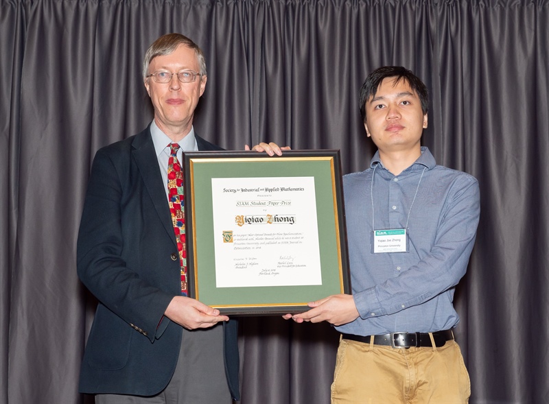 Yiqiao Zhong (right) of Princeton University was awarded the SIAM Student Paper Prize from SIAM President Nick Higham (left) at the 2018 SIAM Annual Meeting.
