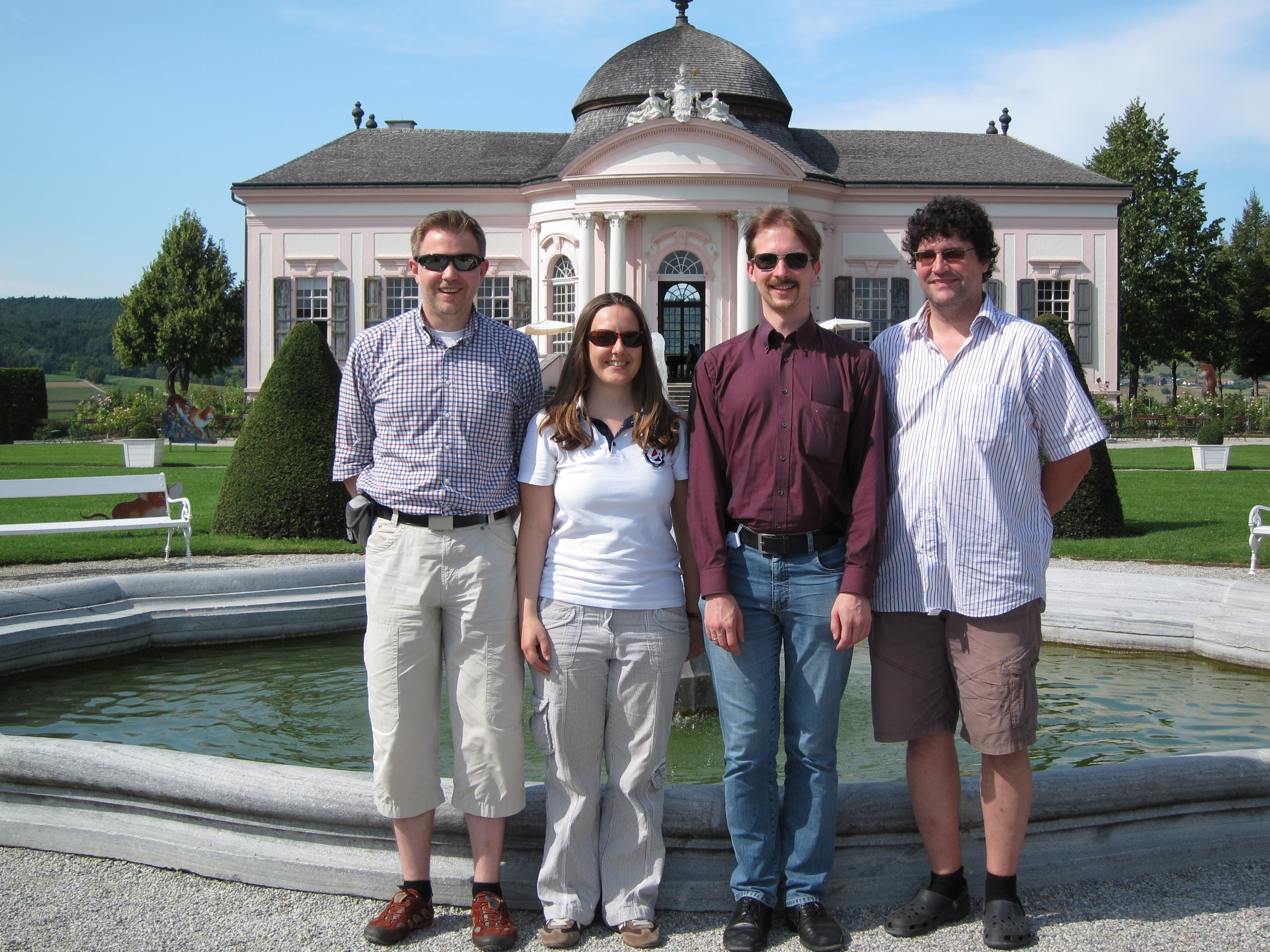 Summer School lecturers in the garden of the Melk monastery. From left: Roland Herzog, Esther Klann, Winnifried Wollner, and Michael Stingl.